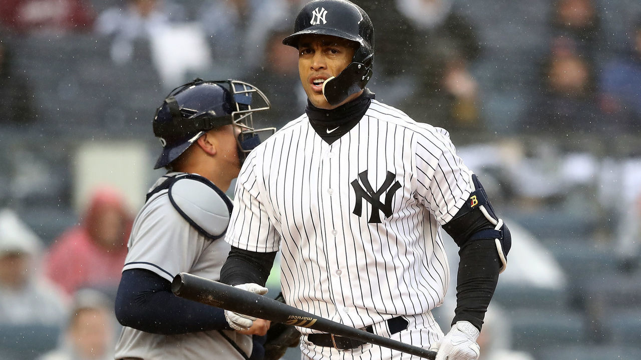 NEW YORK, NY - APRIL 03: Giancarlo Stanton #27 of the New York Yankees strikes out in the third inning against the Tampa Bay Rays during Opening Day at Yankee Stadium on April 3, 2018 in the Bronx borough of New York City.