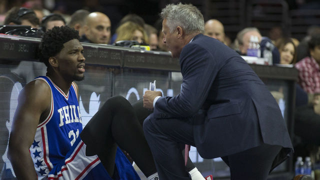 PHILADELPHIA, PA - OCTOBER 26: Head coach Brett Brown of the Philadelphia 76ers talks to Joel Embiid #21 in the fourth quarter against the Philadelphia 76ers at Wells Fargo Center on October 26, 2016 in Philadelphia, Pennsylvania. The Thunder defeated the 76ers 103-97.