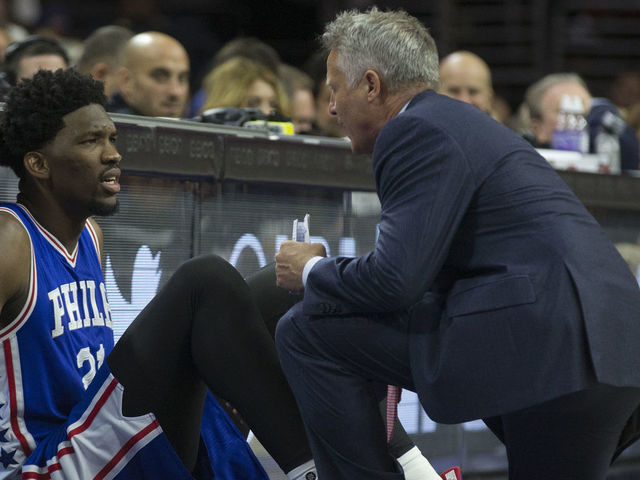 PHILADELPHIA, PA - OCTOBER 26: Head coach Brett Brown of the Philadelphia 76ers talks to Joel Embiid #21 in the fourth quarter against the Philadelphia 76ers at Wells Fargo Center on October 26, 2016 in Philadelphia, Pennsylvania. The Thunder defeated the 76ers 103-97.