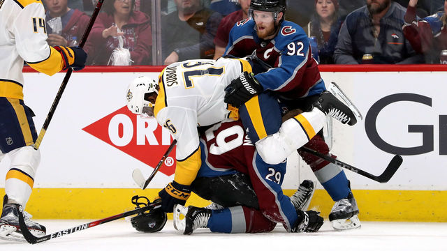 DENVER, CO - APRIL 16: P.K. Subban #76 of the Nashville Predators fight with Nathan MacKinnon #29 and Gabriel Landeskog #92 of the Colorado Rockies in Game Three of the Western Conference First Round during the 2018 NHL Stanley Cup Playoffs at the Pepsi Center on April 16, 2018 in Denver, Colorado.