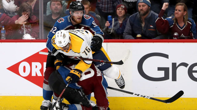 DENVER, CO - APRIL 16: P.K. Subban #76 of the Nashville Predators fight with Nathan MacKinnon #29 and Gabriel Landeskog #92 of the Colorado Rockies in Game Three of the Western Conference First Round during the 2018 NHL Stanley Cup Playoffs at the Pepsi Center on April 16, 2018 in Denver, Colorado.