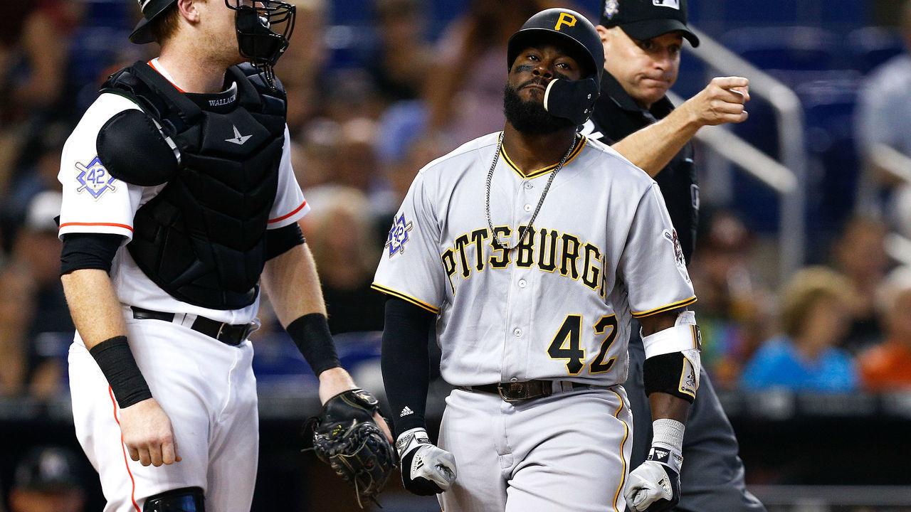 MIAMI, FL - APRIL 15: Josh Harrison #5 of the Pittsburgh Pirates reacts after being hit by a pitch in the third inning against the Miami Marlins at Marlins Park on April 15, 2018 in Miami, Florida. All players are wearing #42 in honor of Jackie Robinson Day.