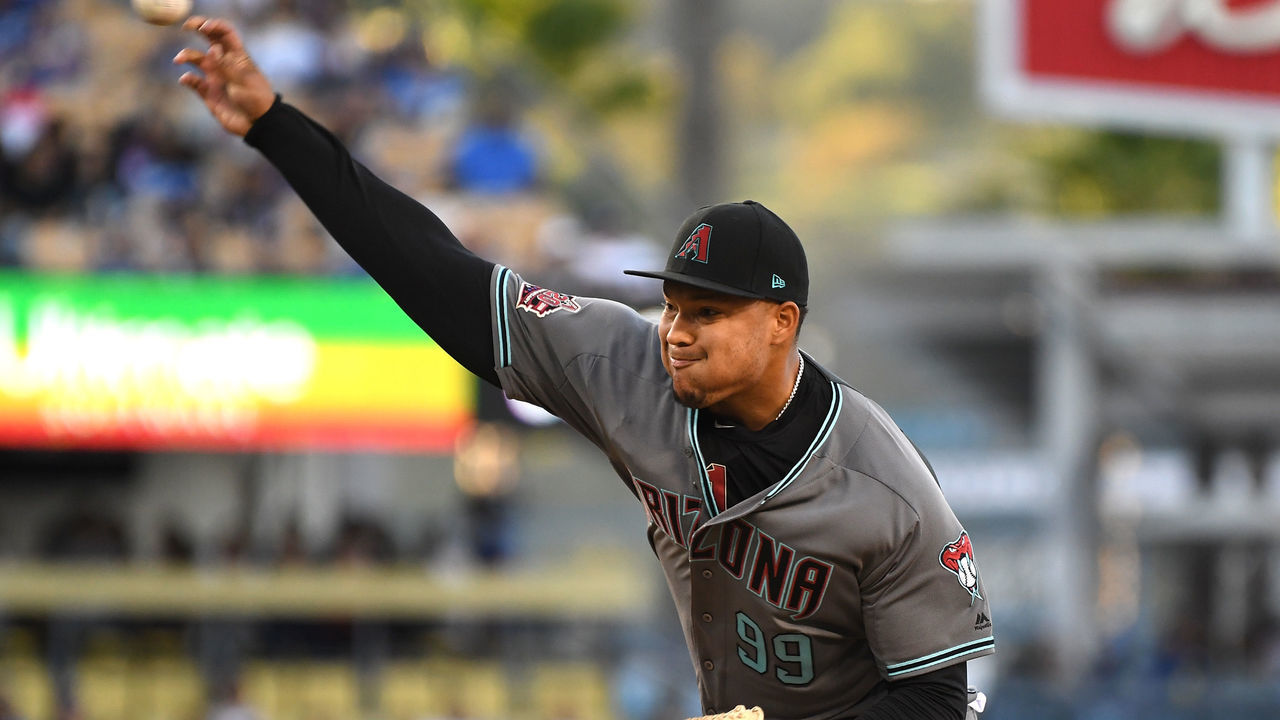 LOS ANGELES, CA - APRIL 14: Taijuan Walker #99 of the Arizona Diamondbacks pitches in the first inning of the game against the Los Angeles Dodgers at Dodger Stadium on April 14, 2018 in Los Angeles, California.