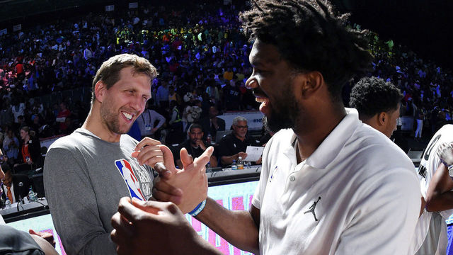 JOHANNESBURG, SOUTH AFRICA - AUGUST 5: Dirk Nowitzki #41 of Team World shakes hands with Joel Embiid #21 of Team Africa in the 2017 Africa Game as part of the Basketball Without Borders Africa at the Ticketpro Dome on August 5, 2017 in Gauteng province of Johannesburg, South Africa. Mandatory Copyright Notice: Copyright 2017 NBAE