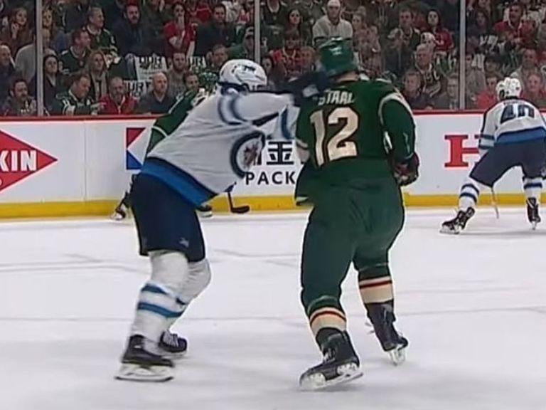 Eric Staal takes brutal cross-check to neck from Jets' Morrissey