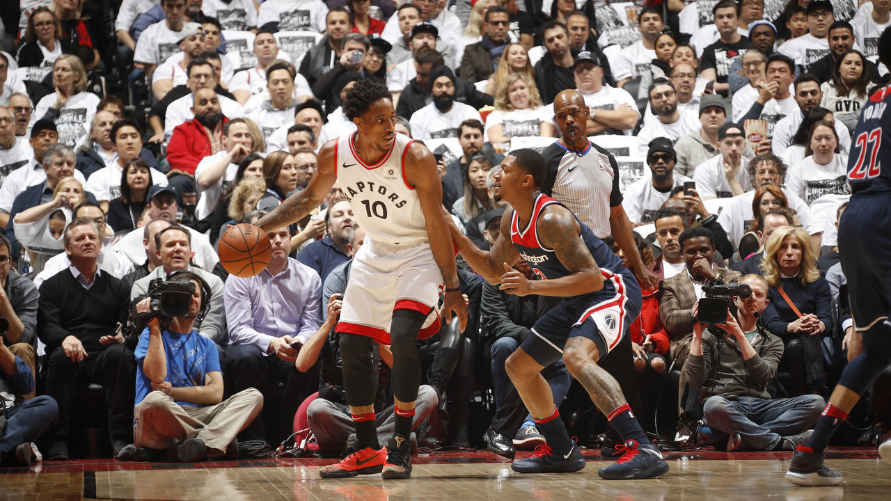 TORONTO, CANADA -APRIL 17: DeMar DeRozan #10 of the Toronto Raptors handles the ball against Bradley Beal #3 of the Washington Wizards in Game Two of Round One of the 2018 NBA Playoffs on April 17, 2018 at the Air Canada Centre in Toronto, Ontario, Canada. Mandatory Copyright Notice: Copyright 2018 NBAE