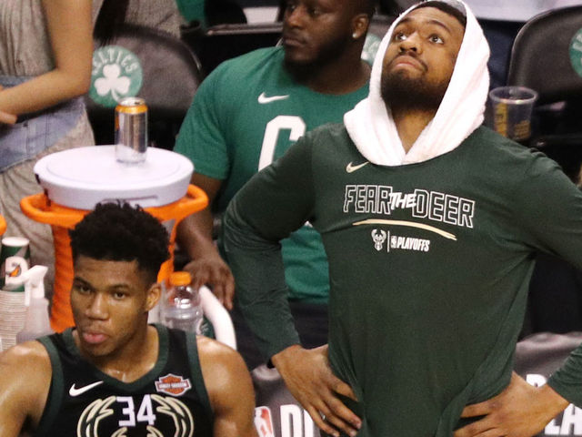 BOSTON, MA - APRIL 17: Giannis Antetokounmpo #34 of the Milwaukee Bucks and Jabari Parker #12 look on from the bench in the fourth quarter of Game Two in Round One of the 2018 NBA Playoffs against the Boston Celtics at TD Garden on April 17, 2018 in Boston, Massachusetts. The Celtics defeat the Bucks 120-106.