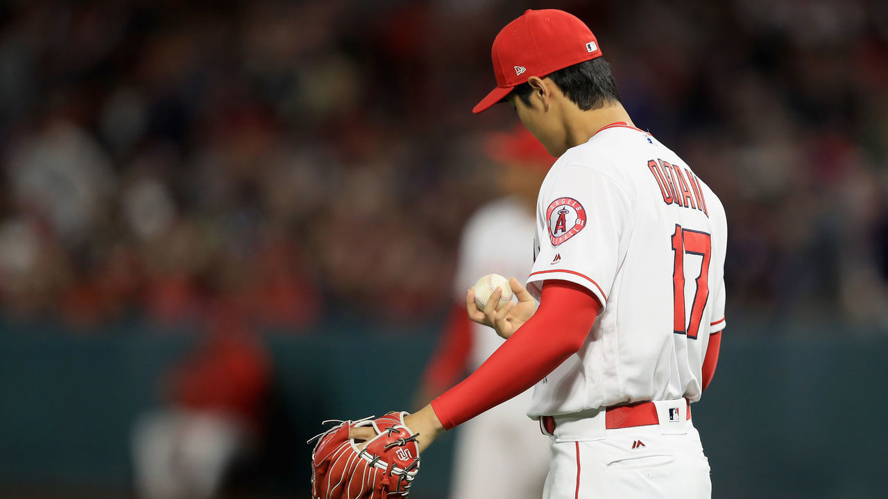 ANAHEIM, CA - APRIL 17: Shohei Ohtani #17 of the Los Angeles Angels of Anaheim looks at the ball during the second inning of a game at bat at Angel Stadium on April 17, 2018 in Anaheim, California.