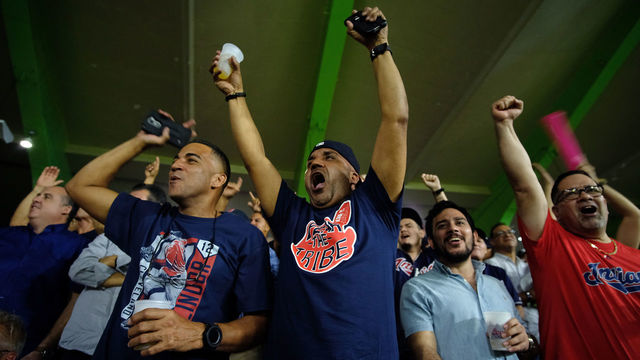 SAN JUAN, PUERTO RICO - APRIL 17: Fans celebrate a home run by Francisco of the Cleveland Indians during the fifth inning against the Minnesota Twins at the Hiram Bithorn Stadium on April 17, 2018 in San Juan, Puerto Rico.