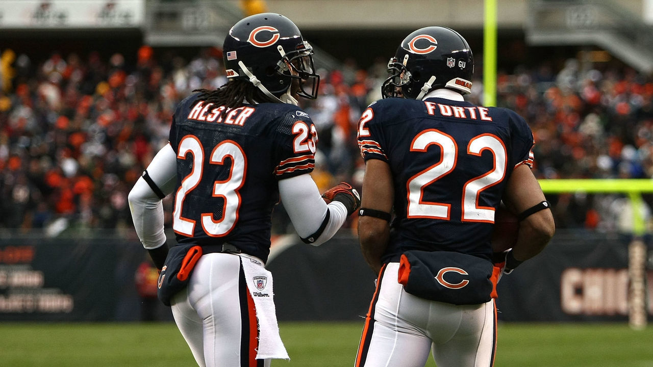 CHICAGO - NOVEMBER 09: Devin Hester #23 and Matt Forte #22 of the Chicago Bears celebrate after Forte scored a on 5-yard touchdown reception in the first quarter against the Tennessee Titans at Soldier Field on November 9, 2008 in Chicago, Illinois.