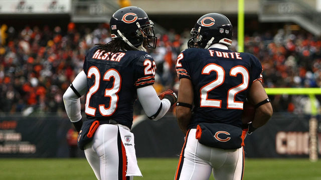 CHICAGO - NOVEMBER 09: Devin Hester #23 and Matt Forte #22 of the Chicago Bears celebrate after Forte scored a on 5-yard touchdown reception in the first quarter against the Tennessee Titans at Soldier Field on November 9, 2008 in Chicago, Illinois.