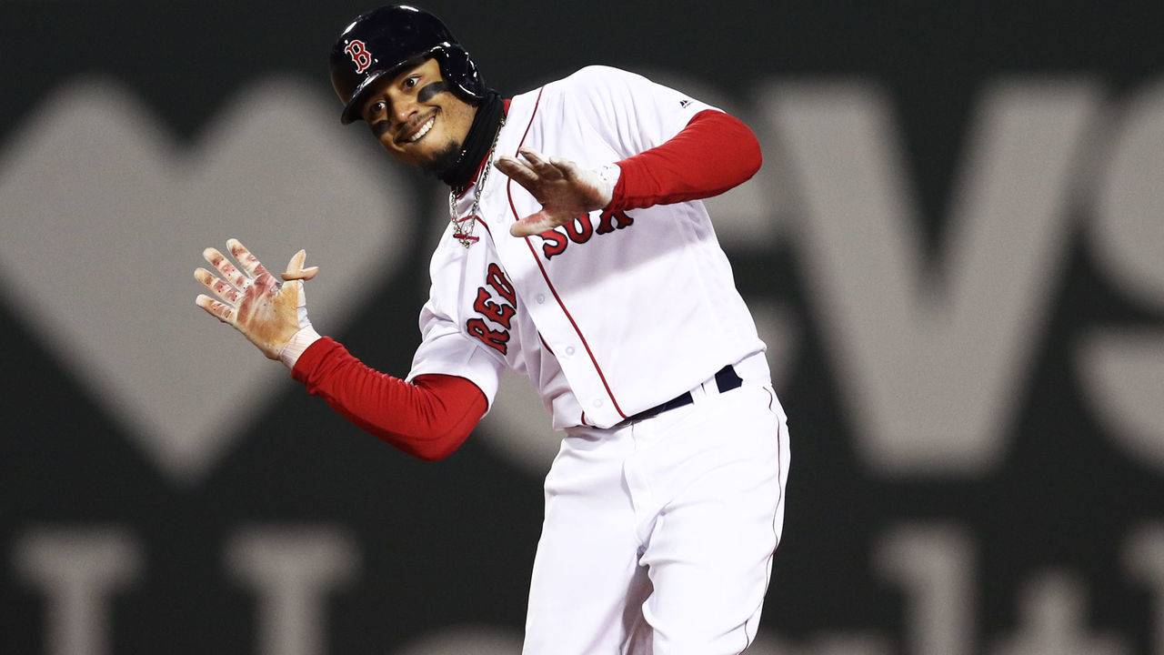 BOSTON, MA - APRIL 10: Mookie Betts #50 of the Boston Red Sox celebrates after hitting a double during the sixth inning against the New York Yankees at Fenway Park on April 10, 2018 in Boston, Massachusetts.