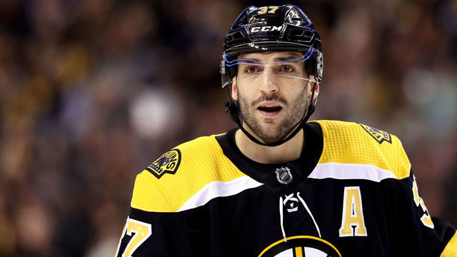 BOSTON, MA - APRIL 14: Patrice Bergeron #37 of the Boston Bruins looks on during the first period of Game Two of the Eastern Conference First Round against the Toronto Maple Leafs during the 2018 NHL Stanley Cup Playoffs at TD Garden on April 14, 2018 in Boston, Massachusetts.