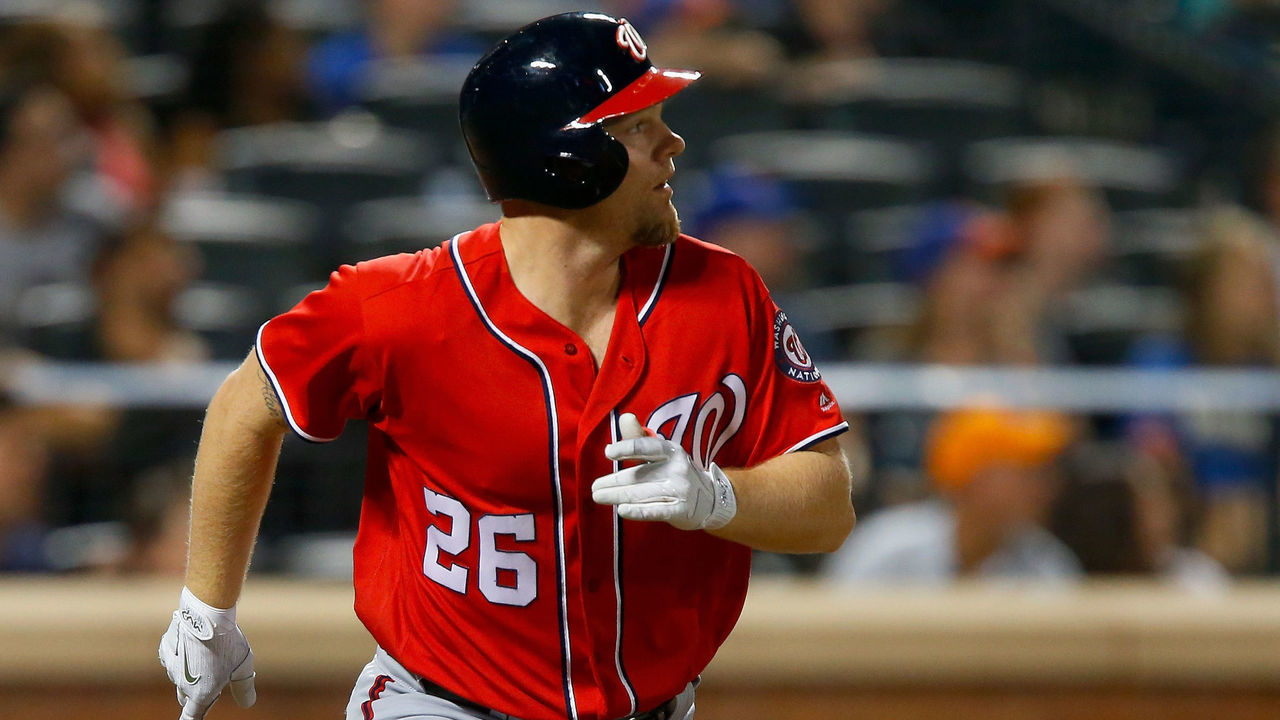 NEW YORK, NY - SEPTEMBER 23: Adam Lind #26 of the Washington Nationals watches the flight of his fourth inning two run home run against the New York Mets at Citi Field on September 23, 2017 in the Flushing neighborhood of the Queens borough of New York City.