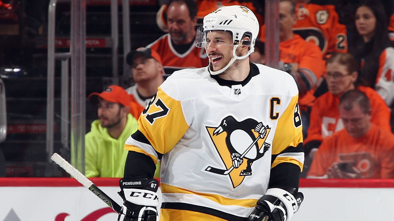 PHILADELPHIA, PA - APRIL 15: Sidney Crosby #87 of the Pittsburgh Penguins celebrates a second period goal by Evgeni Malkin #71 (not shown) against the Philadelphia Flyers in Game Three of the Eastern Conference First Round during the 2018 NHL Stanley Cup Playoffs at the Wells Fargo Center on April 15, 2018 in Philadelphia, Pennsylvania.
