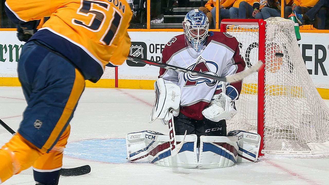 NASHVILLE, TN - APRIL 14: Austin Watson #51 of the Nashville Predators takes a shot wide of goalie Jonathan Bernier #45 of the Colorado Avalanche during the second period in Game Two of the Western Conference First Round during the 2018 NHL Stanley Cup Playoffs at Bridgestone Arena on April 14, 2018 in Nashville, Tennessee.