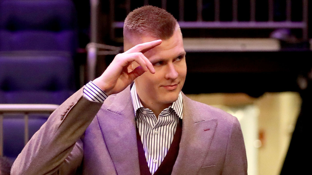 NEW YORK, NY - MARCH 13: Kristaps Porzingis #6 of the New York Knicks is welcomed back after tearing his ACL previously in the season prior to taking on the Dallas Mavericks during their game at Madison Square Garden on March 13, 2018 in New York City.