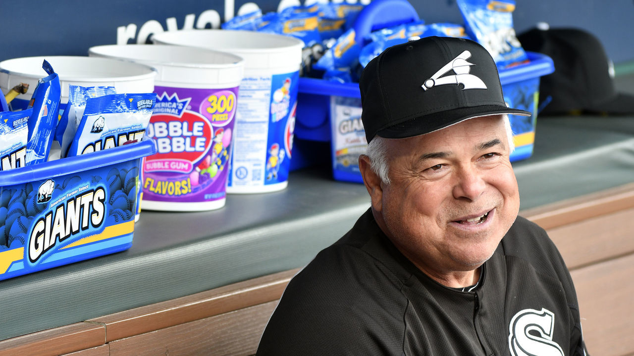 KANSAS CITY, MO - MARCH 31: Rick Renteria #17 manager of the Chicago White Sox sits in the dugout as he watches his team warm up prior to a game against the Kansas City Royals at Kauffman Stadium on March 31, 2018 in Kansas City, Missouri.