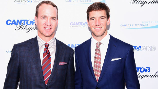 NEW YORK, NY - SEPTEMBER 12: Former NFL player Peyton Manning and NY Giants, NFL player Eli Manning attend the Annual Charity Day hosted by Cantor Fitzgerald, BGC and GFI at Cantor Fitzgerald on September 12, 2016 in New York City.