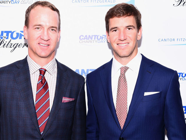 NEW YORK, NY - SEPTEMBER 12: Former NFL player Peyton Manning and NY Giants, NFL player Eli Manning attend the Annual Charity Day hosted by Cantor Fitzgerald, BGC and GFI at Cantor Fitzgerald on September 12, 2016 in New York City.