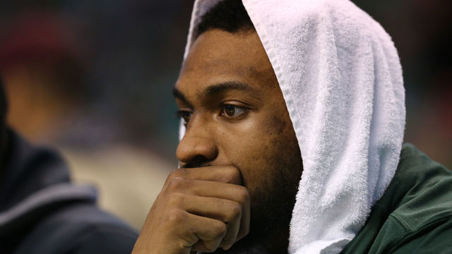 BOSTON, MA - APRIL 15: Jabari Parker #12 of the Milwaukee Bucks looks on from the bench during the third quarter of Game One of Round One of the 2018 NBA Playoffs against the Boston Celtics during at TD Garden on April 15, 2018 in Boston, Massachusetts.