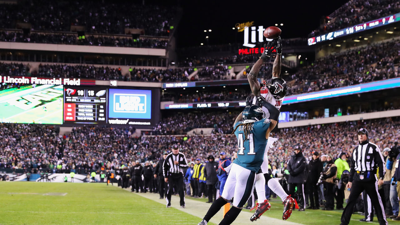 PHILADELPHIA, PA - JANUARY 13: Wide receiver Julio Jones #11 of the Atlanta Falcons attempts to make a catch against cornerback Ronald Darby #41 of the Philadelphia Eagles during the fourth quarter in the NFC Divisional Playoff game at Lincoln Financial Field on January 13, 2018 in Philadelphia, Pennsylvania.