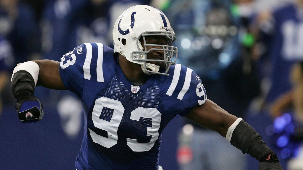 INDIANAPOLIS - JANUARY 06: Dwight Freeney #93 of the Indianapolis Colts celebrates a defensive play against the Kansas City Chiefs during their AFC Wild Card Playoff Game January 6, 2007 at RCA Dome in Indianapolis, Indiana.