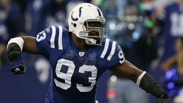 INDIANAPOLIS - JANUARY 06: Dwight Freeney #93 of the Indianapolis Colts celebrates a defensive play against the Kansas City Chiefs during their AFC Wild Card Playoff Game January 6, 2007 at RCA Dome in Indianapolis, Indiana.