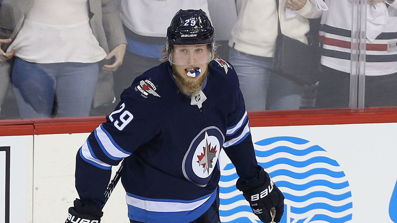 WINNIPEG, MANITOBA - APRIL 13: Patrik Laine #29 of the Winnipeg Jets celebrates his goal against the Minnesota Wild in Game Two of the Western Conference First Round during the 2018 NHL Stanley Cup Playoffs on April 13, 2018 at Bell MTS Place in Winnipeg, Manitoba, Canada.