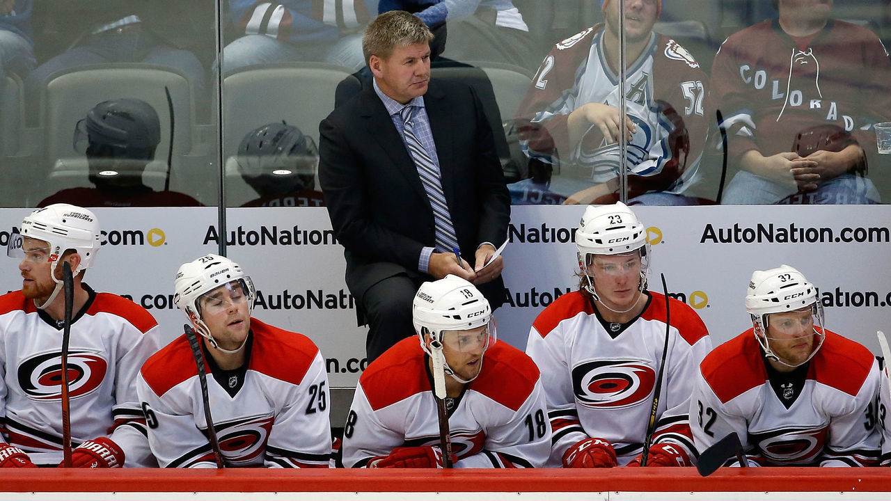 DENVER, CO - OCTOBER 21: Head coach Bill Peters of the Carolina Hurricanes leads his team against the Colorado Avalanche at Pepsi Center on October 21, 2015 in Denver, Colorado. The Hurricanes defeated the Avalanche 1-0 in overtime.