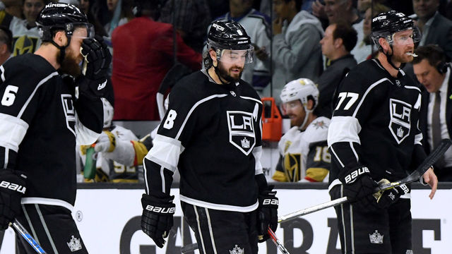 LOS ANGELES, CA - APRIL 17: Jake Muzzin #6, Drew Doughty #8 and Jeff Carter #77 of the Los Angeles Kings skate back to the bench after a Kings's timeout trailing 1-0 to the Vegas Golden Knights with less than a minute in Game Four of the Western Conference First Round during the 2018 NHL Stanley Cup Playoffs at Staples Center on April 17, 2018 in Los Angeles, California. The Golden Knights won 1-0 to sweep the series.