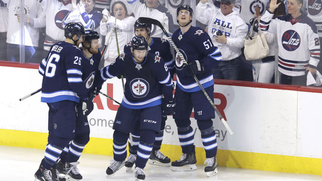 Jets blow out Wild to win 1st playoff series in franchise history