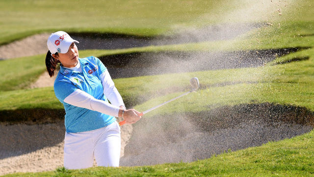 LOS ANGELES, CA - APRIL 20: Moriya Jutanugarn of Thailand hits out of a bunker on the 18th green during round two of the Hugel-JTBC Championship at the Wilshire Country Club on April 20, 2018 in Los Angeles, California.