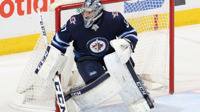 WINNIPEG, MB - APRIL 20: Goaltender Connor Hellebuyck #37 of the Winnipeg Jets guards the net during second period action against the Minnesota Wild in Game Five of the Western Conference First Round during the 2018 NHL Stanley Cup Playoffs at the Bell MTS Place on April 20, 2018 in Winnipeg, Manitoba, Canada.