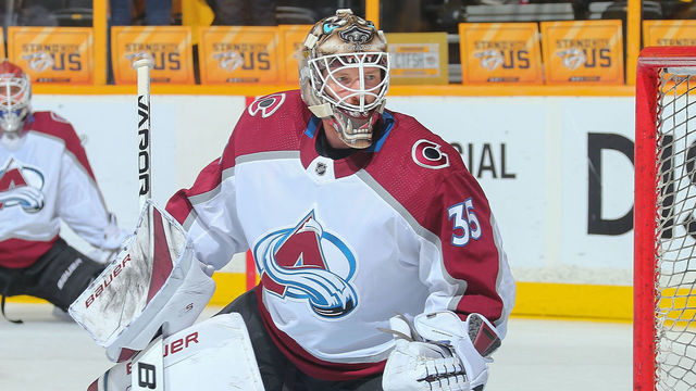 NASHVILLE, TN - APRIL 20: Spencer Martin #30 of the Colorado Avalanche watches teammate Andrew Hammond #35 warms up prior to a game against the Nashville Predators in Game Five of the Western Conference First Round during the 2018 NHL Stanley Cup Playoffs at Bridgestone Arena on April 20, 2018 in Nashville, Tennessee.