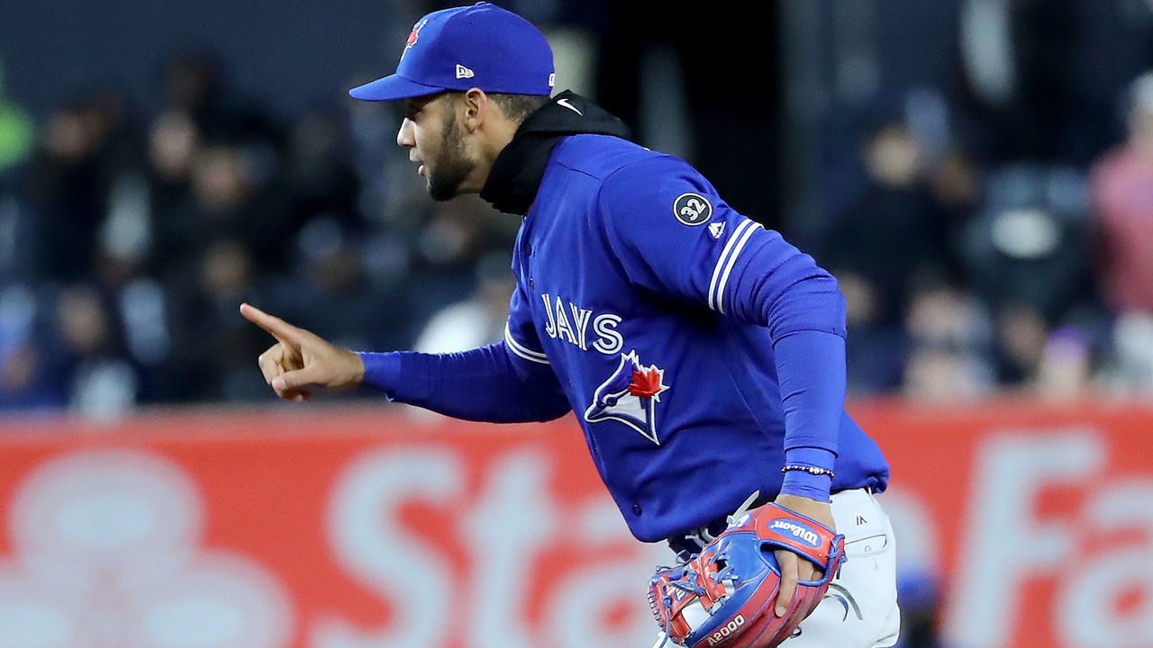 NEW YORK, NY - APRIL 20: Lourdes Gurriel Jr.#13 of the Toronto Blue Jays celebrates the 8-5 win over the New York Yankees at Yankee Stadium on April 20, 2018 in the Bronx borough of New York City.