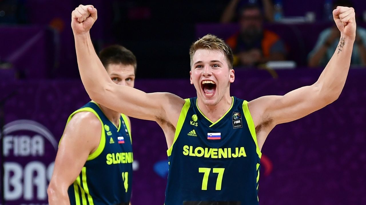 Slovenia's guard Luka Doncic celebrates after scoring during the FIBA Eurobasket 2017 men's semi-final basketball match between Spain and Slovenia at the Fenerbahce Ulker Sport Arena in Istanbul on September 14, 2017. / AFP PHOTO / OZAN KOSE