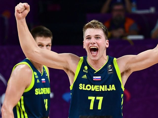 Slovenia's guard Luka Doncic celebrates after scoring during the FIBA Eurobasket 2017 men's semi-final basketball match between Spain and Slovenia at the Fenerbahce Ulker Sport Arena in Istanbul on September 14, 2017. / AFP PHOTO / OZAN KOSE