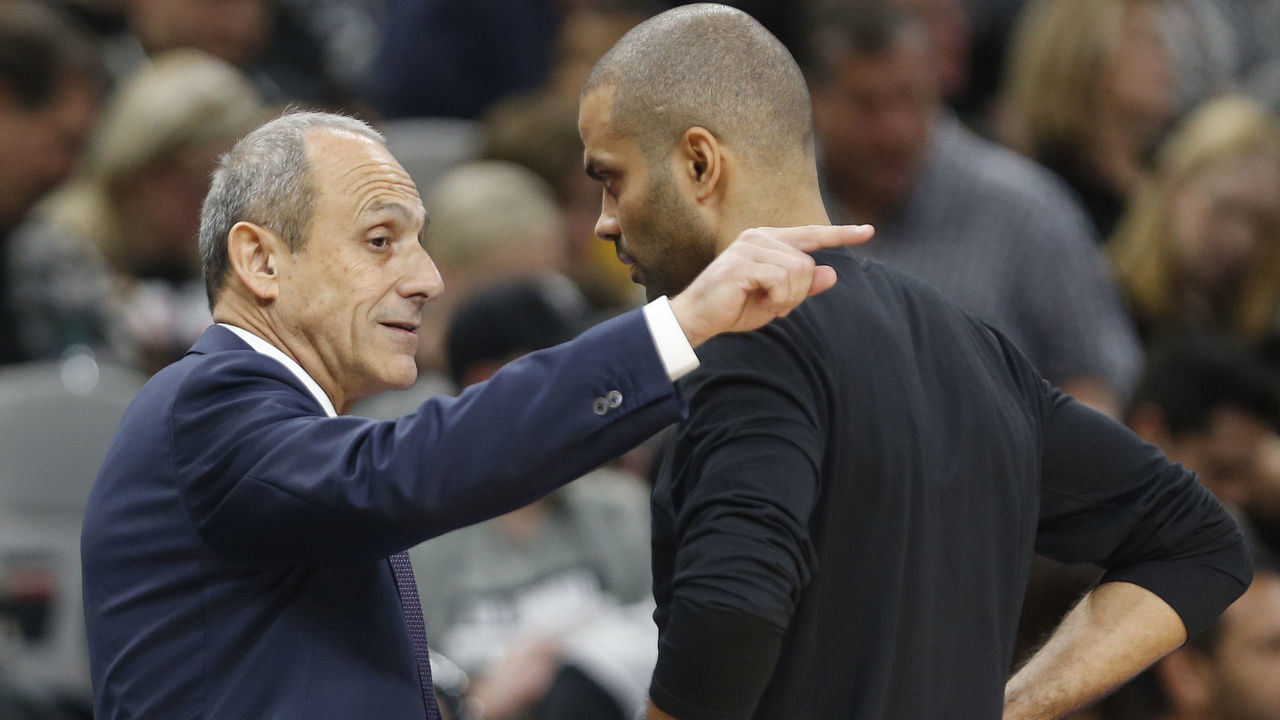 SAN ANTONIO,TX - APRIL 19 : Ettore Messina talks to Tony Parker #9 of the San Antonio Spurs. Messina replaced Gregg Popvich head coach of the San Antonio Spurs who is missing the game against the Golden State Warriors due to his wife death at AT&T Center on April 19 , 2018 in San Antonio, Texas. NOTE TO USER: User expressly acknowledges and agrees that , by downloading and or using this photograph, User is consenting to the terms and conditions of the Getty Images License Agreement.