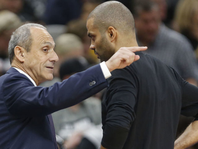 SAN ANTONIO,TX - APRIL 19 : Ettore Messina talks to Tony Parker #9 of the San Antonio Spurs. Messina replaced Gregg Popvich head coach of the San Antonio Spurs who is missing the game against the Golden State Warriors due to his wife death at AT&T Center on April 19 , 2018 in San Antonio, Texas. NOTE TO USER: User expressly acknowledges and agrees that , by downloading and or using this photograph, User is consenting to the terms and conditions of the Getty Images License Agreement.