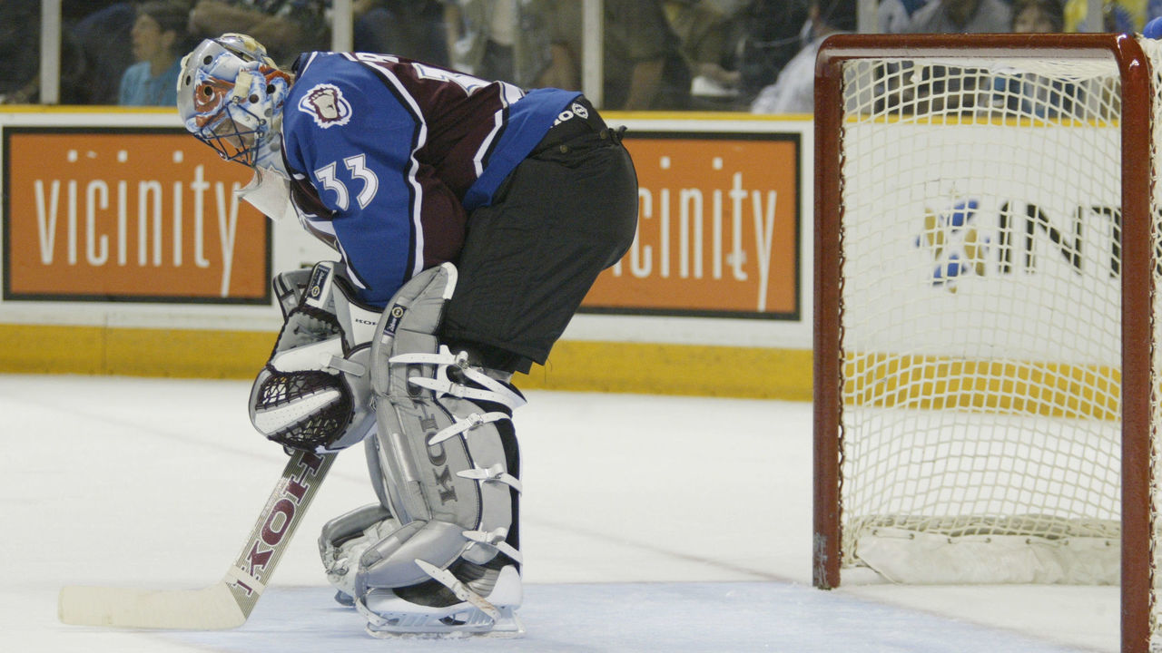 SAN JOSE, CA - MAY 13: Goaltender Patrick Roy #33 of the Colorado Avalanche hunches over to catch his breath against the San Jose Sharks during Game 6 of the Western Conference Semifinals of the NHL Stanley Cup Playoffs at the Compaq Center in San Jose, California on May 13, 2002. The Avalanche won 2-1.