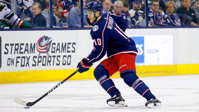 COLUMBUS, OH - JANUARY 30: Alexander Wennberg #10 of the Columbus Blue Jackets controls the puck during the game against the Minnesota Wild on January 30, 2018 at Nationwide Arena in Columbus, Ohio.