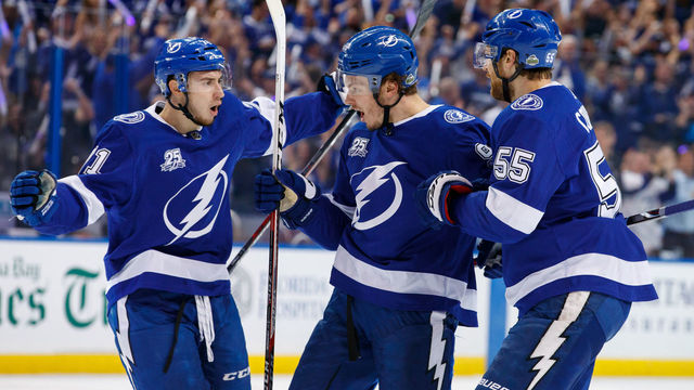 TAMPA, FL - APRIL 21: Mikhail Sergachev #98 of the Tampa Bay Lightning celebrates his goal with teammates Anthony Cirelli #71 and Braydon Coburn #55 against the New Jersey Devils in Game Five of the Eastern Conference First Round during the 2018 NHL Stanley Cup Playoffs at Amalie Arena on April 21, 2018 in Tampa, Florida.