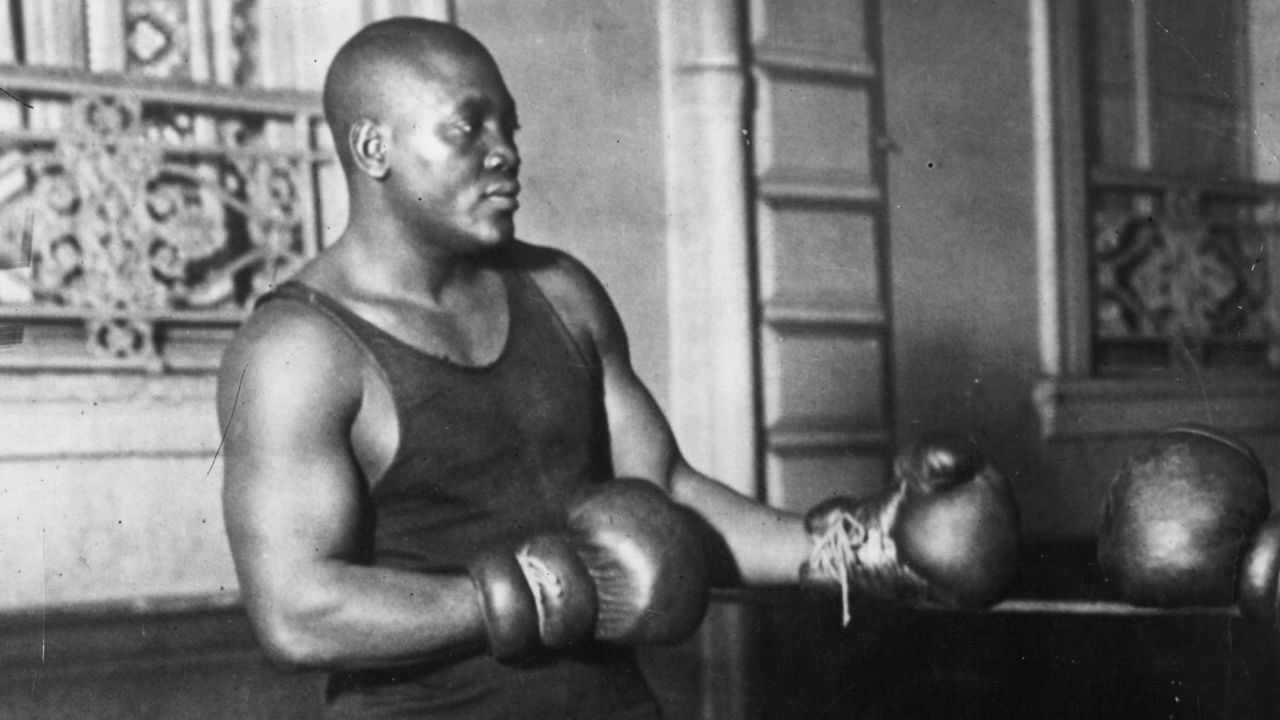 American heavyweight boxer Jack Johnson in action sparring.