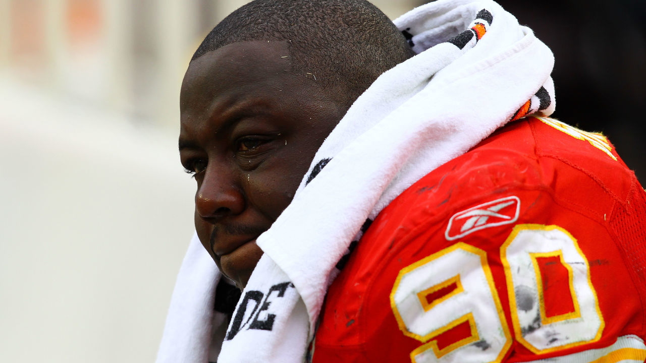 KANSAS CITY, MO - JANUARY 09: Defensive tackle Shaun Smith #90 of the Kansas City Chiefs cries on the bench after losing 30-7 to of the Baltimore Ravens in the 2011 AFC wild card playoff game at Arrowhead Stadium on January 9, 2011 in Kansas City, Missouri.