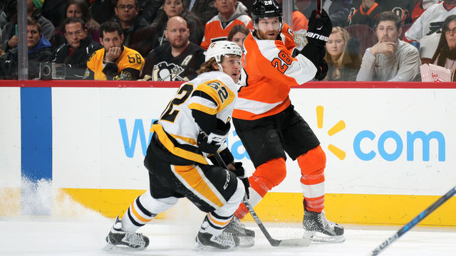 PHILADELPHIA, PA - JANUARY 02: Claude Giroux #28 of the Philadelphia Flyers in action against Carl Hagelin #62 of the Pittsburgh Penguins on January 2, 2018 at the Wells Fargo Center in Philadelphia, Pennsylvania.