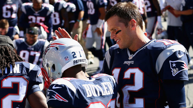 FOXBORO, MA - SEPTEMBER 27: Tom Brady #12 of the New England Patriots talks to Malcolm Butler #21 during half time against the Jacksonville Jaguars at Gillette Stadium on September 27, 2015 in Foxboro, Massachusetts.