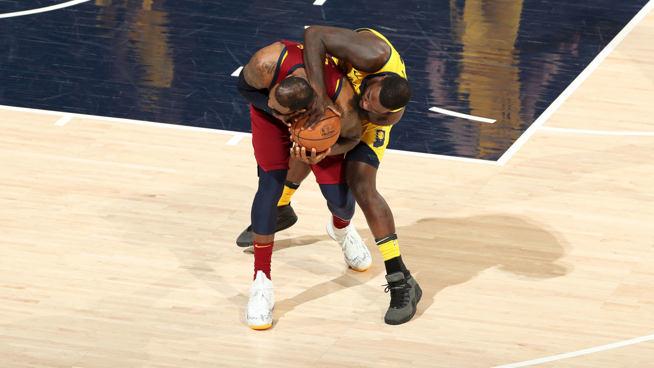 INDIANAPOLIS, IN - APRIL 22: LeBron James #23 of the Cleveland Cavaliers and Lance Stephenson #1 of the Indiana Pacers fight for possession of the ball in Game Four of Round One of the 2018 NBA Playoffs on April 22, 2018 at Bankers Life Fieldhouse in Indianapolis, Indiana. Mandatory Copyright Notice: Copyright 2018 NBAE