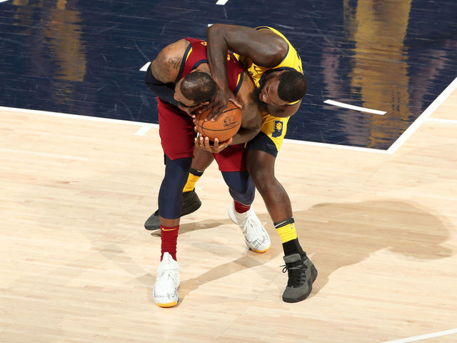 INDIANAPOLIS, IN - APRIL 22: LeBron James #23 of the Cleveland Cavaliers and Lance Stephenson #1 of the Indiana Pacers fight for possession of the ball in Game Four of Round One of the 2018 NBA Playoffs on April 22, 2018 at Bankers Life Fieldhouse in Indianapolis, Indiana. Mandatory Copyright Notice: Copyright 2018 NBAE