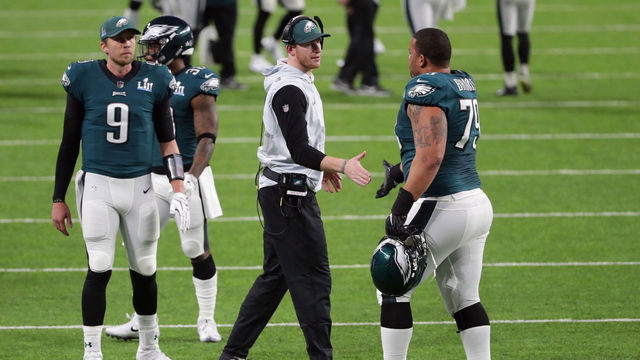 MINNEAPOLIS, MN - FEBRUARY 04: Brandon Brooks #79 is congratulated by his teammate Carson Wentz #11 of the Philadelphia Eagles after their first quarter field goal against the New England Patriots in Super Bowl LII at U.S. Bank Stadium on February 4, 2018 in Minneapolis, Minnesota.